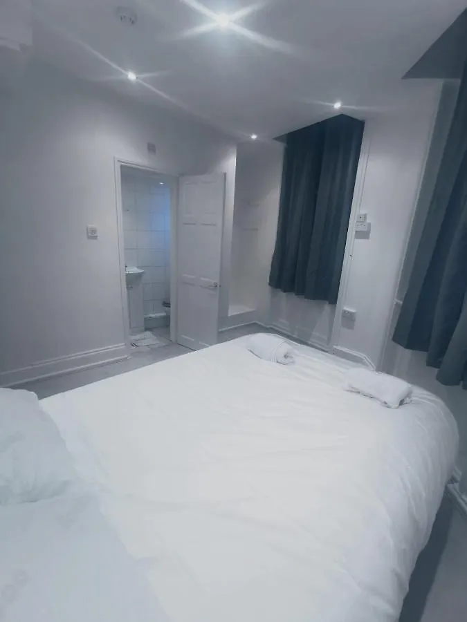 Y2 Guest House Londres Alojamento de Acomodação e Pequeno-almoço